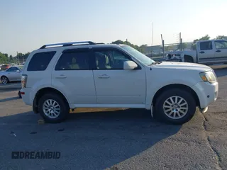 2011 Mercury Mariner Premier with VIN 4M2CN8HG0BKJ02401, listed as a IAAI auction lot 42579483 with 126,276 mi miles and . Bid and sale history available at DreamBid. Image 13.