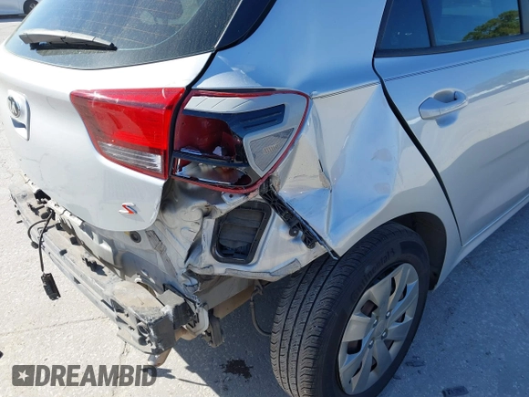 2020 Kia Rio S with VIN 3KPA25AD4LE309303, listed as a IAAI auction lot 41800912 with 75,393 mi miles and . Bid and sale history available at DreamBid. Image 6.