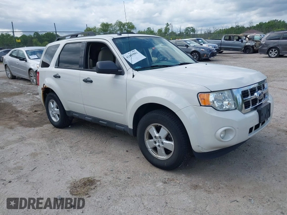 2012 Ford Escape XLT z VIN 1FMCU9DG2CKB18584, wystawiony jako IAAI lot #42469881 z przebiegiem 166 469 mil mil oraz . Historia ofert i sprzedaży dostępna na DreamBid. Obrazek 1.