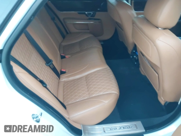 2017 Jaguar XJ with VIN SAJWJ2GD5H8W08395, listed as a IAAI auction lot 41014883 with 80,584 mi miles. Bid and sale history available at carsss.com. Image 8.
