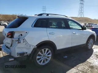 2015 Mazda CX-9 Grand Touring с VIN JM3TB2DA1F0462203, выставлен на аукционе Copart как лот 37073714 с пробегом 101 293 миль миль и Списание • Salvage title. История ставок и продаж доступна на DreamBid. Изображение 3.