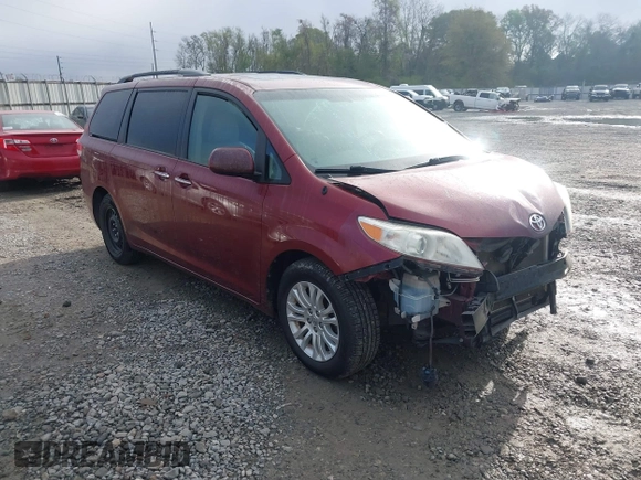 2014 Toyota Sienna XLE with VIN 5TDYK3DCXES471676, listed as a IAAI auction lot 41853038 with 169,790 mi miles. Bid and sale history available at carsss.com. Image 1.