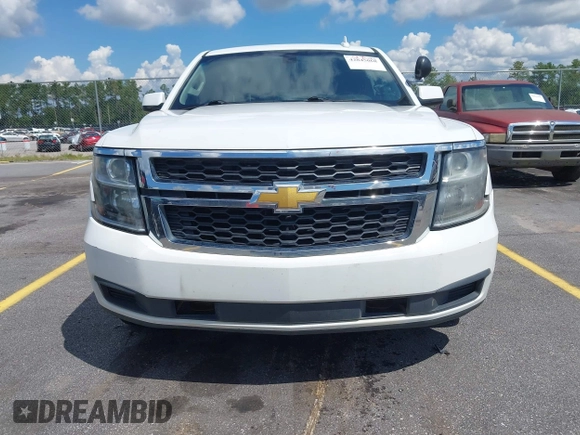 2018 Chevrolet Tahoe Commercial z VIN 1GNLCDEC1JR155210, wystawiony jako IAAI lot #42845068 z przebiegiem 159 456 mil mil oraz . Historia ofert i sprzedaży dostępna na DreamBid. Obrazek 6.