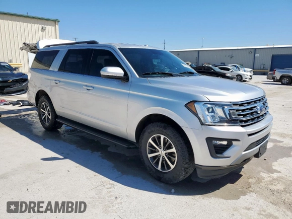 2019 Ford Expedition Max XLT with VIN 1FMJK1JT8KEA37151, listed as a Copart auction lot 50173895 with 142,360 mi miles and Salvage Title. Bid and sale history available at DreamBid. Image 4.