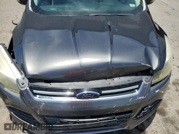 2015 Ford Escape Titanium z VIN 1FMCU0J98FUB06577, wystawiony jako Copart lot #61341175 z przebiegiem 66 206 mil mil oraz Szkoda całkowita • Salvage title. Historia ofert i sprzedaży dostępna na DreamBid. Obrazek 12.