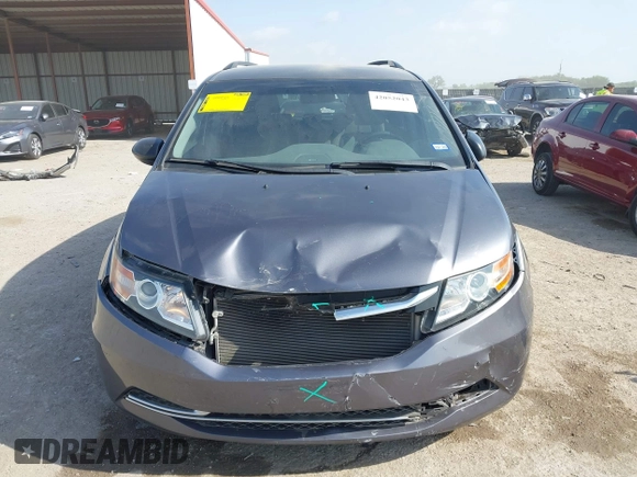 2015 Honda Odyssey LX with VIN 5FNRL5H29FB032327, listed as a IAAI auction lot 42052043 with 153,365 mi miles and . Bid and sale history available at DreamBid. Image 12.