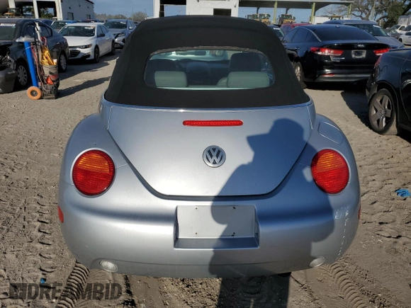 2004 Volkswagen Beetle with VIN 3VWCM21Y34M300701, listed as a Copart auction lot 77567344 with 91,236 mi miles and Salvage Title. Bid and sale history available at DreamBid. Image 6.