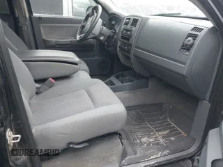 2007 Dodge Dakota SLT z VIN 1D7HW48P87S271192, wystawiony jako IAAI lot #41421142 z przebiegiem 198 588 mil mil oraz . Historia ofert i sprzedaży dostępna na DreamBid. Obrazek 5.