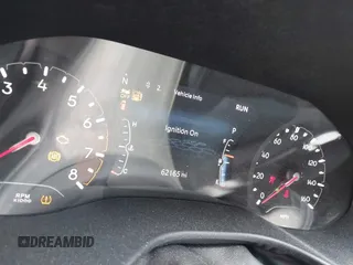 2023 Jeep Compass Latitude with VIN 3C4NJDBN5PT509999, listed as a IAAI auction lot 42206354 with 62,165 mi miles and . Bid and sale history available at DreamBid. Image 7.