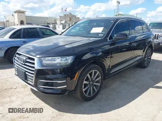 2017 Audi Q7 Premium Plus with VIN WA1LAAF72HD017790, listed as a IAAI auction lot 42624444 with 77,400 mi miles and . Bid and sale history available at DreamBid. Image 2.