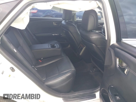 2013 Toyota Avalon XLE with VIN 4T1BK1EB4DU047982, listed as a IAAI auction lot 42011402 with 122,645 mi miles and . Bid and sale history available at DreamBid. Image 8.