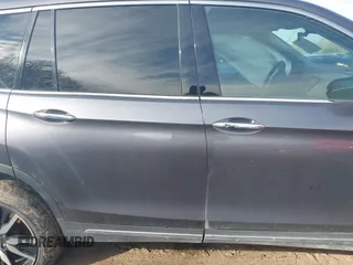 2019 Honda Pilot Touring 7-Passenger with VIN 5FNYF6H67KB018769, listed as a IAAI auction lot 41310452 with 92,499 mi miles. Bid and sale history available at carsss.com. Image 12.