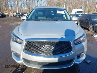 2019 Infiniti QX60 LUXE with VIN 5N1DL0MN3KC568514, listed as a IAAI auction lot 41308997 with 96,807 mi miles. Bid and sale history available at carsss.com. Image 12.