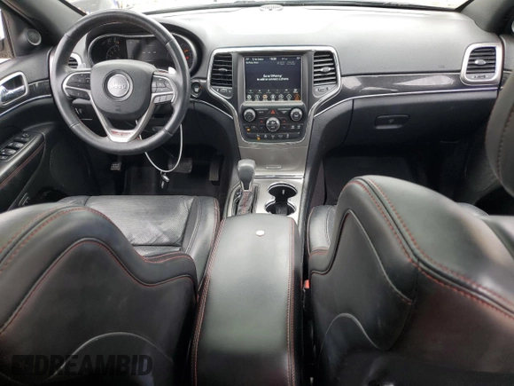 2018 Jeep Grand Cherokee Trailhawk with VIN 1C4RJFLG1JC264781, listed as a Copart auction lot 61524135 with 82,786 mi miles and Salvage title. Bid and sale history available at DreamBid. Image 8.