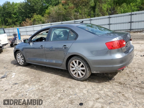 2014 Volkswagen Jetta SE with VIN 3VWD17AJ0EM246952, listed as a Copart auction lot 57507645 with 127,764 mi miles and Clean title. Bid and sale history available at DreamBid. Image 2.