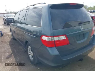 2005 Honda Odyssey EX-L with VIN 5FNRL38645B421253, listed as a IAAI auction lot 42106184 with 157,717 mi miles. Bid and sale history available at carsss.com. Image 3.