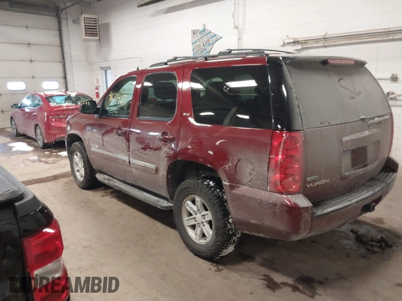 2011 GMC Yukon SLT with VIN 1GKS2CE08BR308792, listed as a IAAI auction lot 41633427 with 216,483 mi miles. Bid and sale history available at carsss.com. Image 3.