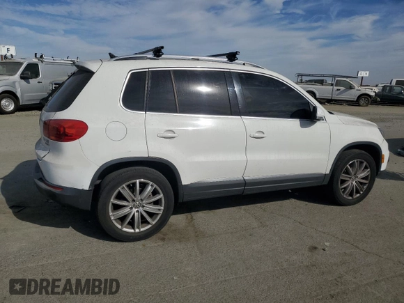 2012 Volkswagen Tiguan S with VIN WVGBV7AX3CW575463, listed as a Copart auction lot 77889064 with 168,520 mi miles and Salvage Title. Bid and sale history available at DreamBid. Image 3.