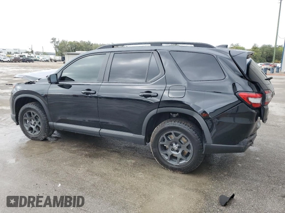 2025 Honda Pilot TrailSport with VIN 5FNYG1H63SB087572, listed as a Copart auction lot 86802994 with 962 mi miles and Salvage Title. Bid and sale history available at carsss.com. Image 2.