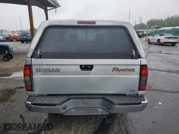 2000 Nissan Frontier XE с VIN 1N6DD21S4YC321371, выставлен на аукционе Copart как лот 55678675 с пробегом 99 775 миль миль и Списание • Salvage title. История ставок и продаж доступна на DreamBid. Изображение 6.