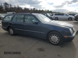 2001 Mercedes-Benz E-Class AWD with VIN WDBJH82J81X052002, listed as a Copart auction lot 82832724 with 187,464 mi miles and Salvage Title. Bid and sale history available at carsss.com. Image 4.