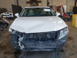 2013 Lexus ES 300h Hybrid with VIN JTHBW1GG4D2036539, listed as a IAAI auction lot 42121701 with 157,855 mi miles. Bid and sale history available at carsss.com. Image 13.