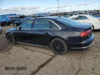 2015 Audi A8 L 4.0T with VIN WAU32AFD3FN036507, listed as a Copart auction lot 49121635 with 77,257 mi miles and Salvage Title. Bid and sale history available at carsss.com. Image 2.