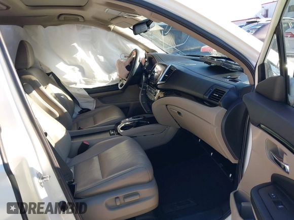 2017 Honda Pilot Touring with VIN 5FNYF6H98HB102313, listed as a IAAI auction lot 41244311 with 106,931 mi miles. Bid and sale history available at carsss.com. Image 5.