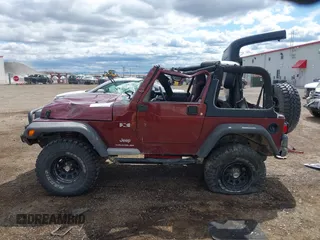 2003 Jeep Wrangler X z VIN 1J4FA39S73P349014, wystawiony jako IAAI lot #42582747 z przebiegiem 50 525 mil mil oraz . Historia ofert i sprzedaży dostępna na DreamBid. Obrazek 15.