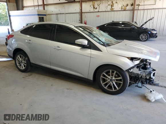 2016 Ford Focus SE с VIN 1FADP3F28GL280966, выставлен на аукционе Copart как лот 57911285 с пробегом Не указан миль и Списание • Salvage title. История ставок и продаж доступна на DreamBid. Изображение 4.