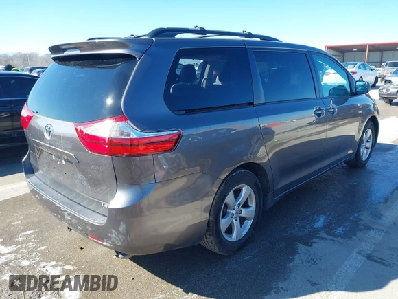 2016 Toyota Sienna LE AAS with VIN 5TDKK3DC1GS732265, listed as a IAAI auction lot 41701180 with 116,738 mi miles. Bid and sale history available at carsss.com. Image 4.