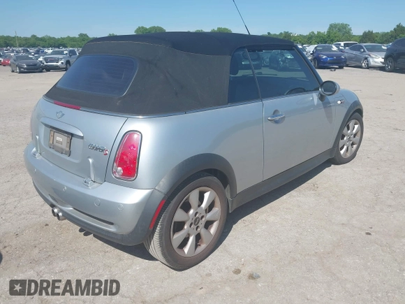 2006 MINI Convertible S with VIN WMWRH33596TK59633, listed as a IAAI auction lot 42242545 with 77,837 mi miles and . Bid and sale history available at DreamBid. Image 4.