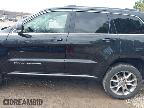 2015 Jeep Grand Cherokee Summit with VIN 1C4RJFJGXFC882787, listed as a IAAI auction lot 42098274 with 147,020 mi miles and . Bid and sale history available at DreamBid. Image 14.