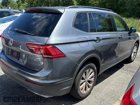 2018 Volkswagen Tiguan S z VIN 3VV0B7AX2JM014870, wystawiony jako Copart lot #65734835 z przebiegiem 118 575 mil mil oraz Czysty tytuł • Clean title. Historia ofert i sprzedaży dostępna na DreamBid. Obrazek 4.