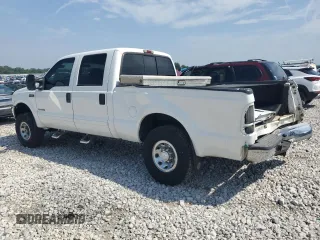2002 Ford Super Duty F-250 XL with VIN 1FTNW21F72ED29593, listed as a Copart auction lot 68245844 with 301,129 mi miles and Salvage Title. Bid and sale history available at carsss.com. Image 2.