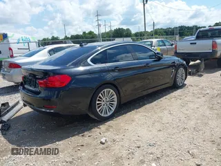 2015 BMW 4 Series 428i с VIN WBA4A5C51FG052589, выставлен на аукционе IAAI как лот 42354325 с пробегом Не указан миль и . История ставок и продаж доступна на DreamBid. Изображение 4.
