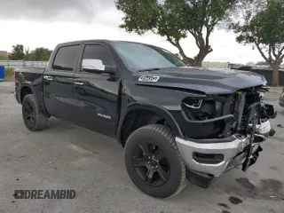 2022 Ram 1500 Laramie with VIN 1C6SRFJT4NN300006, listed as a Copart auction lot 54976775 with 61,436 mi miles and Salvage title. Bid and sale history available at DreamBid. Image 4.