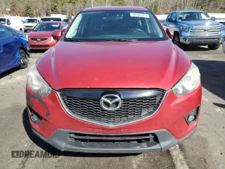 2014 Mazda CX-5 Grand Touring with VIN JM3KE4DY8E0421660, listed as a Copart auction lot 48588525 with 144,939 mi miles and Salvage Title. Bid and sale history available at DreamBid. Image 5.