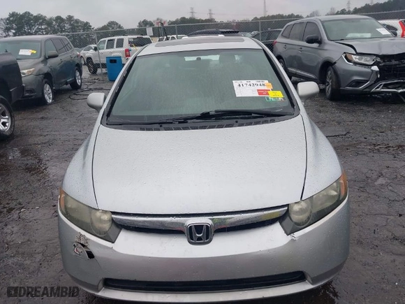 2007 Honda Civic Sdn EX with VIN 1HGFA16887L096416, listed as a IAAI auction lot 41742948 with 198,911 mi miles. Bid and sale history available at carsss.com. Image 12.