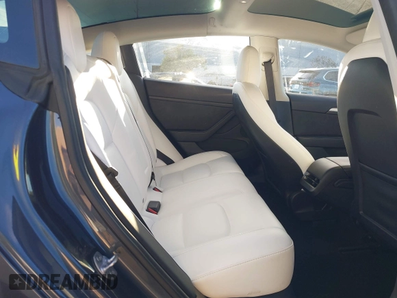 2022 Tesla Model 3 Long Range with VIN 5YJ3E1EB4NF293635, listed as a IAAI auction lot 41388234 with 28,396 mi miles and . Bid and sale history available at DreamBid. Image 8.