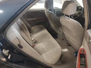 2002 Toyota Camry LE z VIN 4T1BE32K82U626817, wystawiony jako IAAI lot #42157820 z przebiegiem 200 810 mil mil oraz . Historia ofert i sprzedaży dostępna na DreamBid. Obrazek 8.