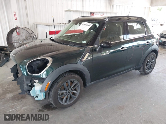 2013 MINI Countryman S with VIN WMWZC3C56DWP24170, listed as a IAAI auction lot 42366594 with 143,311 mi miles and . Bid and sale history available at DreamBid. Image 18.