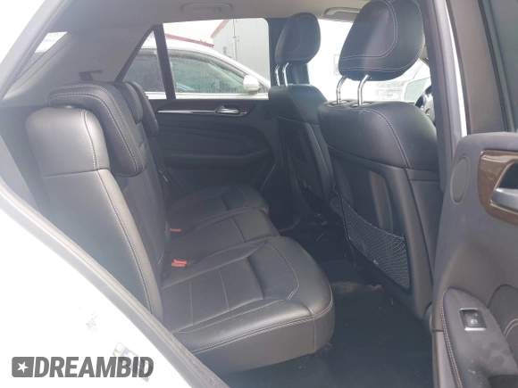 2015 Mercedes-Benz M 350 with VIN 4JGDA5HB8FA555696, listed as a IAAI auction lot 42156465 with 92,660 mi miles and . Bid and sale history available at DreamBid. Image 8.