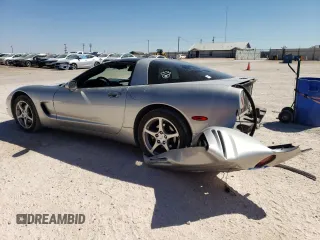2004 Chevrolet Corvette with VIN 1G1YY22G945102769, listed as a Copart auction lot 74500664 with 64,718 mi miles and Salvage Title. Bid and sale history available at carsss.com. Image 2.