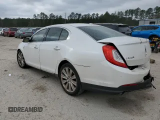 2013 Lincoln MKS EcoBoost with VIN 1LNHL9FT0DG607721, listed as a Copart auction lot 85129344 with 158,191 mi miles and Salvage title. Bid and sale history available at DreamBid. Image 2.