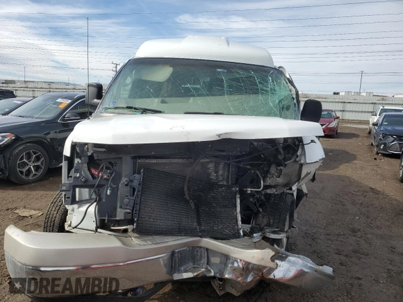 2004 Chevrolet Express Passenger z VIN 1GBFG15T041144358, wystawiony jako Copart lot #45413355 z przebiegiem Nie podano mil oraz Szkoda całkowita • Salvage title. Historia ofert i sprzedaży dostępna na DreamBid. Obrazek 5.
