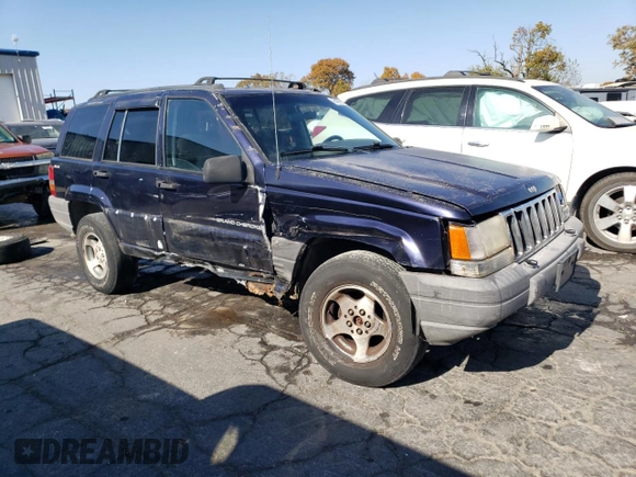 1998 Jeep Grand Cherokee Laredo with VIN 1J4GZ58S8WC167716, listed as a Copart auction lot 76477694 with 167,519 mi miles and Salvage Title. Bid and sale history available at carsss.com. Image 4.