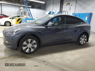 2023 Tesla Model Y Long Range z VIN 7SAYGDEE2PA199512, wystawiony jako Copart lot #55292985 z przebiegiem 25 295 mil mil oraz Szkoda całkowita • Salvage title. Historia ofert i sprzedaży dostępna na DreamBid. Obrazek 1.