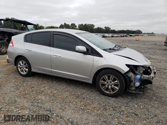 2010 Honda Insight EX with VIN JHMZE2H71AS039108, listed as a Copart auction lot 54557145 with 151,230 mi miles and Salvage title. Bid and sale history available at DreamBid. Image 4.