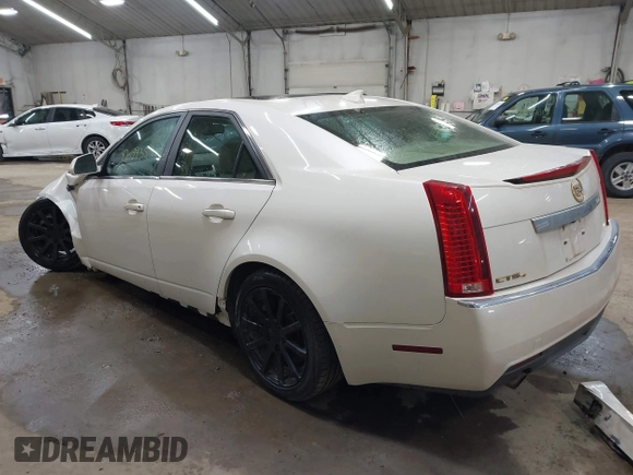 2012 Cadillac CTS Sedan Luxury with VIN 1G6DG5E55C0143029, listed as a IAAI auction lot 42099357 with 90,141 mi miles. Bid and sale history available at carsss.com. Image 3.